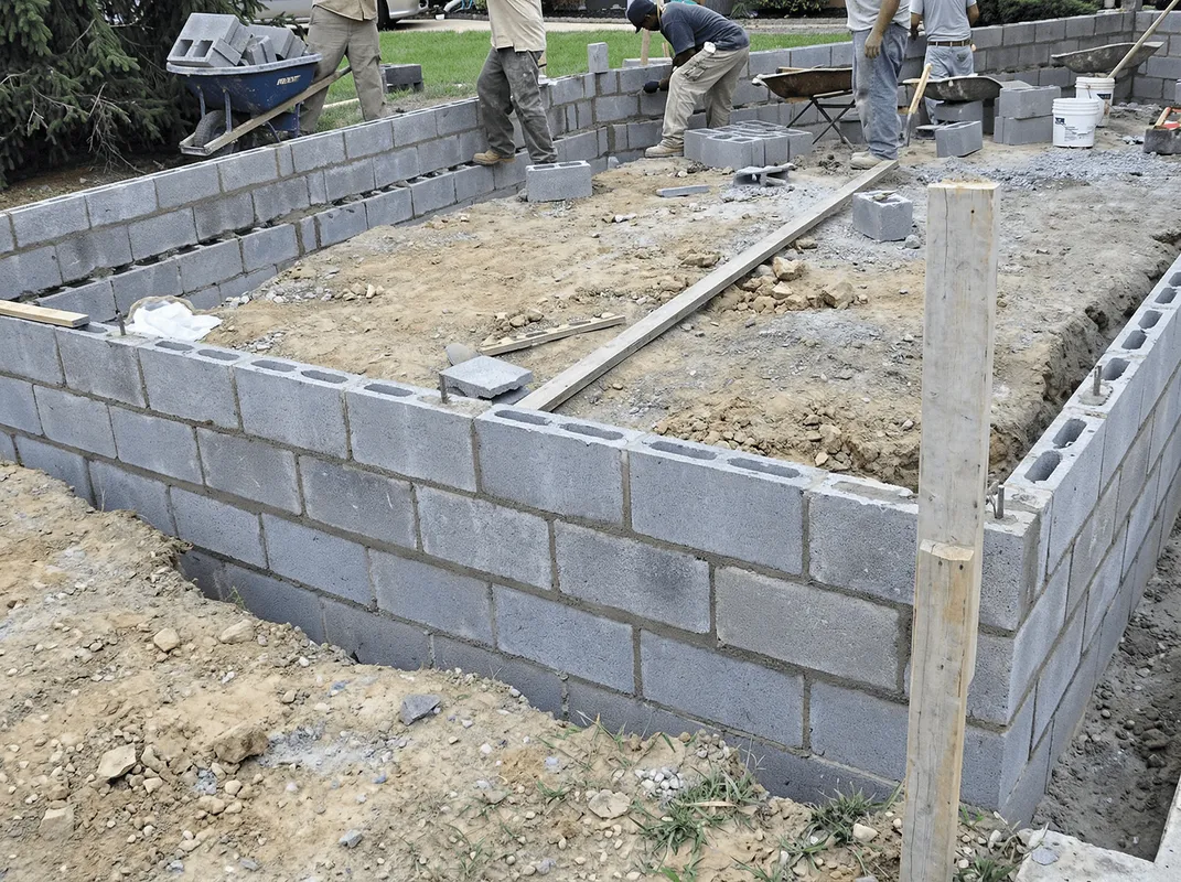 Professionals building a foundation with blocks in Madison, WI