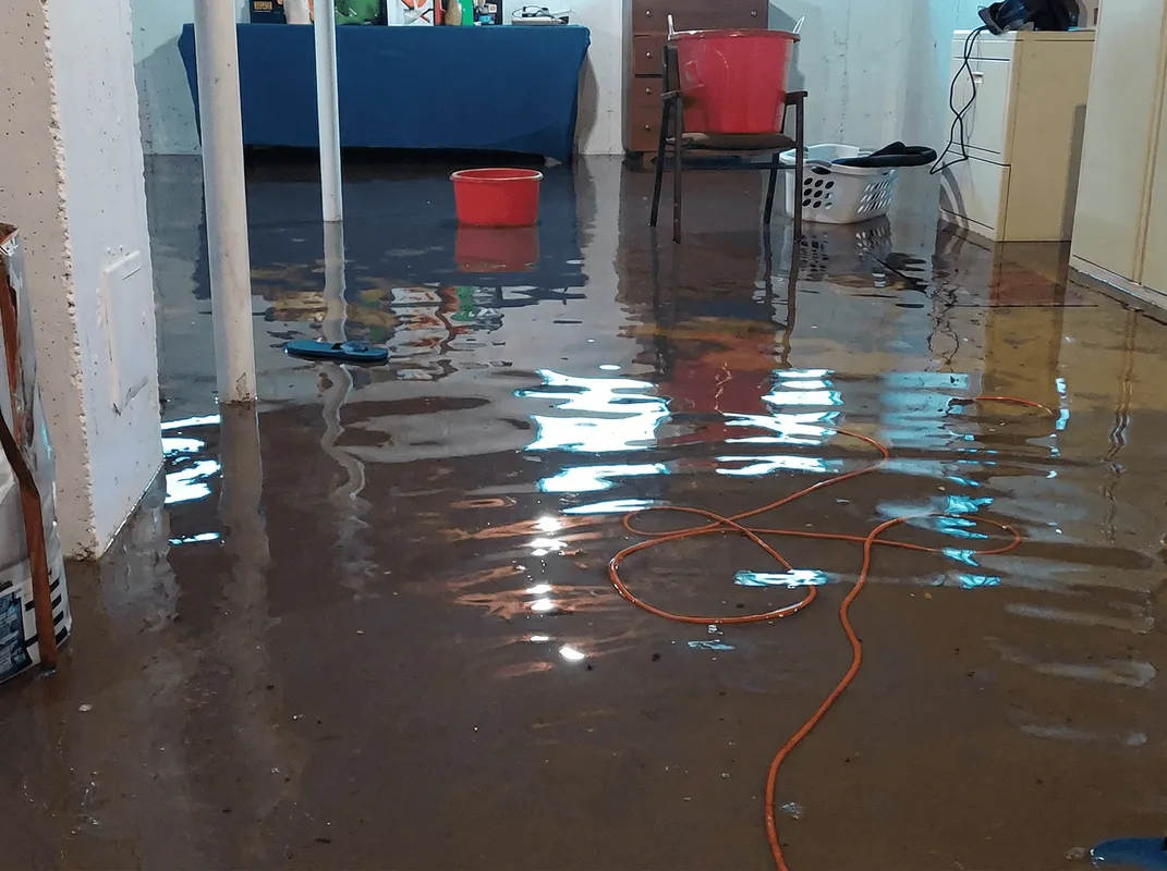 Basement with boiler, cabinets and washing machine completely flooded in Madison, WI